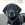 Headshot of a black dog in a body collar.