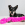 A small black and brown dog with a pink KONG toy laying on white carpet.